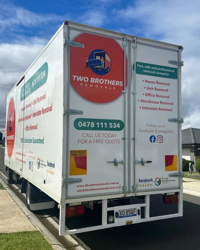 Two Brothers Removals branded moving truck parked on a Sydney residential street